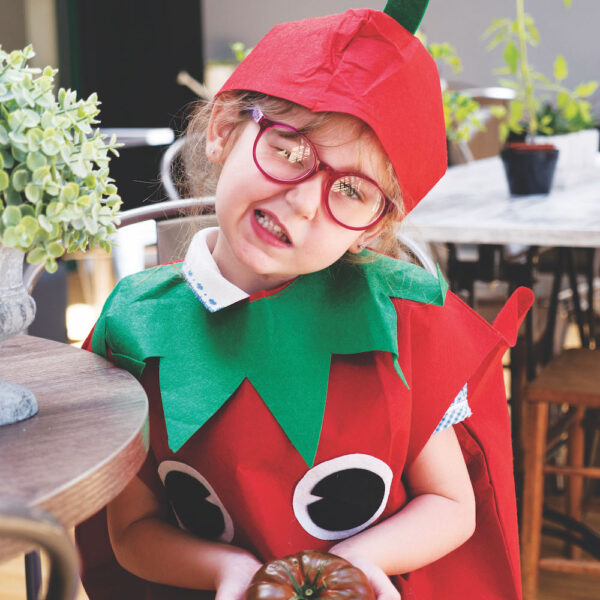 Girl dressed as tomato at Peartree - square supporters sign up