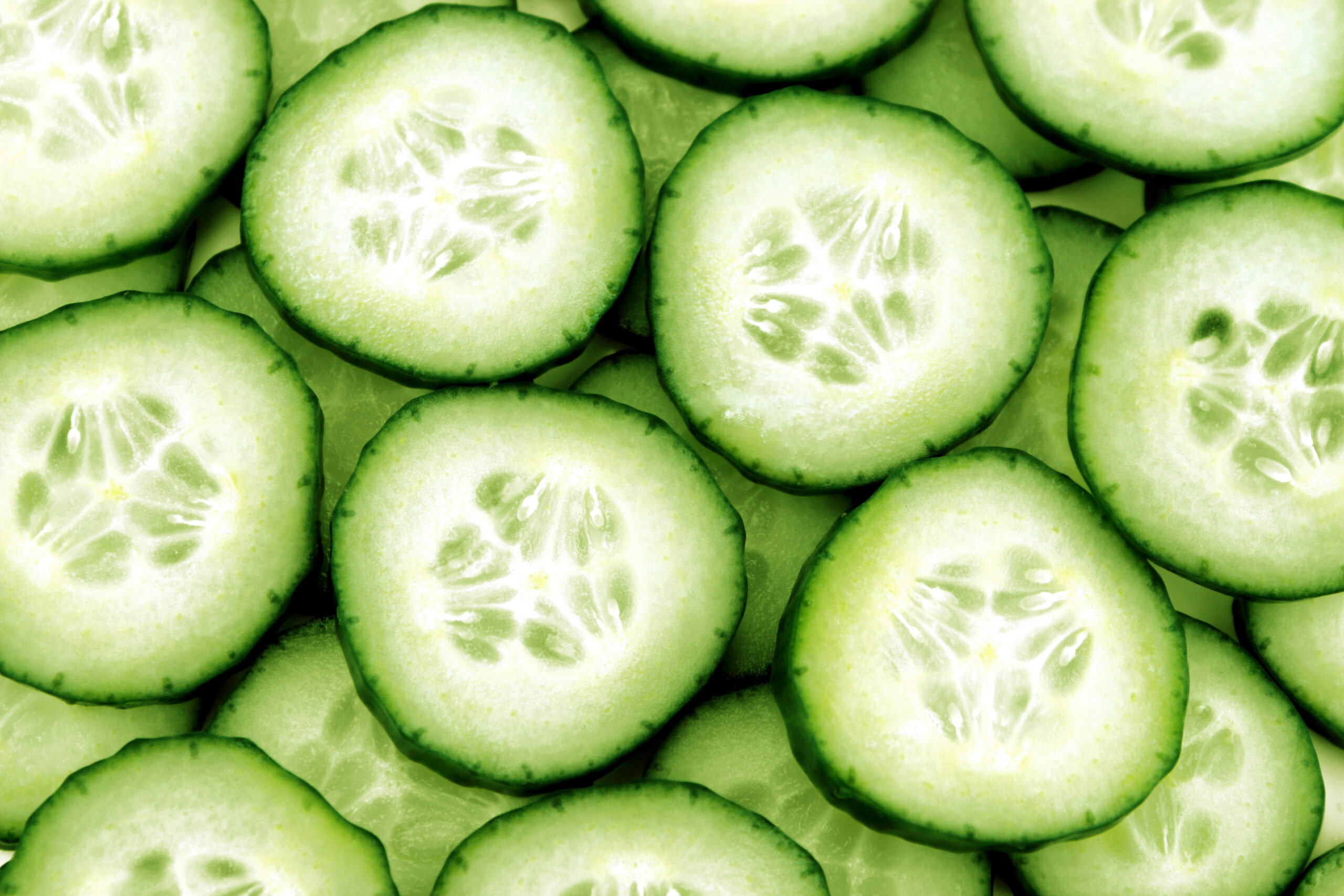 Fresh,Cucumber,And,Slices,White,Background.