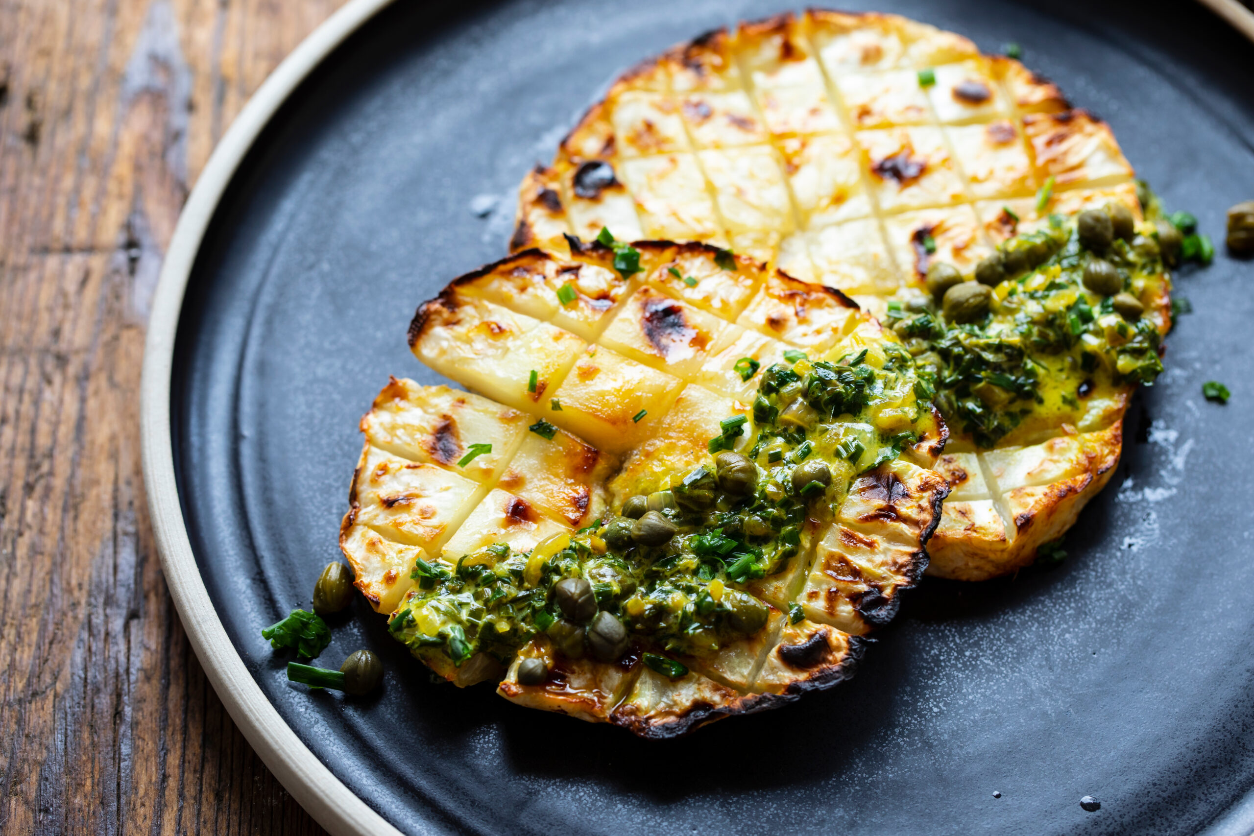 Roasted,Celeriac,Steak,With,Capers,And,Herb,Sauce